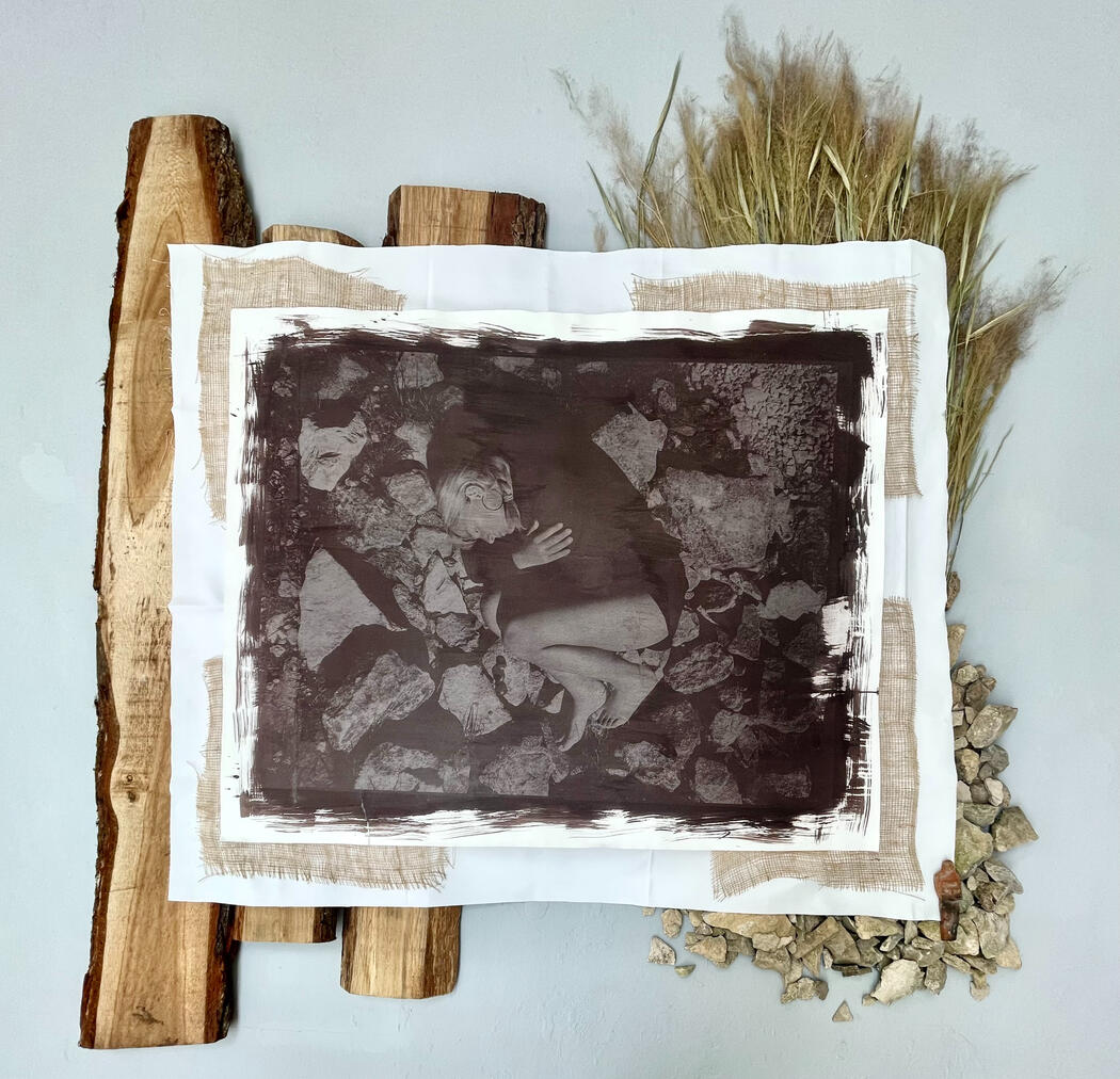 51.694262° N 2.029724° W Salt print on watercolour paper, Gloucestershire Oak wood, Cotswold limestone, dried grasses, white denim and hessian fabrics, foraged river clay Coventina figurine. 180 x 200 x 12 cm 2026